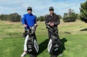 Andy Proudman and Piers Ward from Me and My Golf standing on a golf course with Titleist-branded clubs and bags, celebrating their new equipment partnership.
